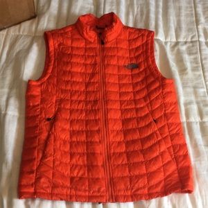 Orange North Face Puffer Vest
